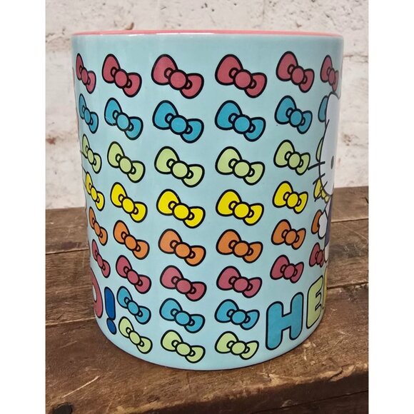 Hello Kitty Ceramic Mug Multi-Colored Bow Print Pastel Blue Pink Interior - Picture 2 of 7